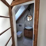 V Podkrovi Lägenhet