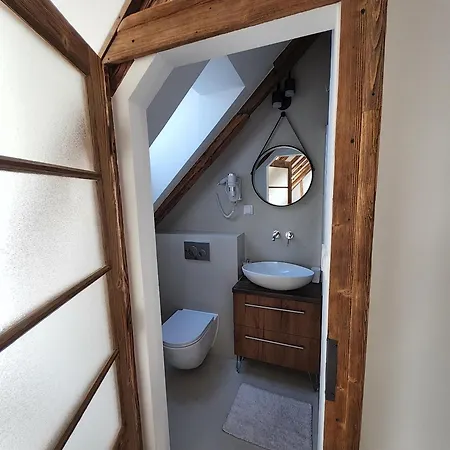 V Podkrovi Lägenhet